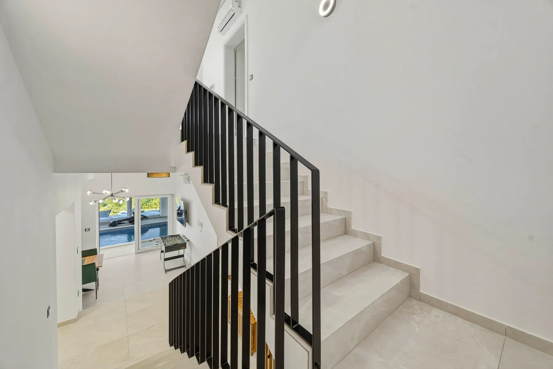 Interior staircase and games area